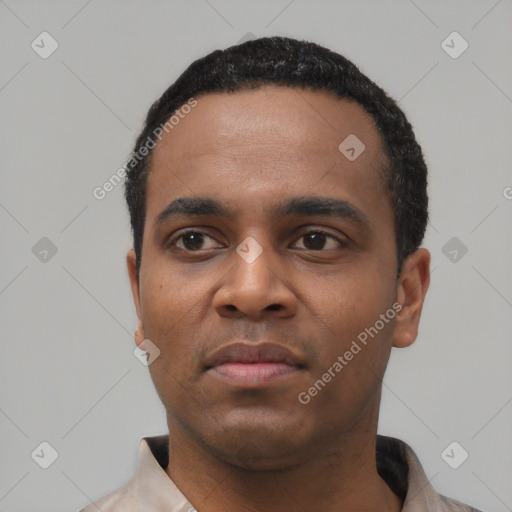 Neutral latino young-adult male with short  black hair and brown eyes