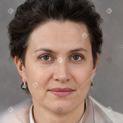 Joyful white adult female with short  brown hair and brown eyes