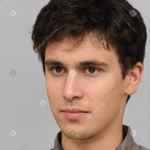 Neutral white young-adult male with short  brown hair and brown eyes