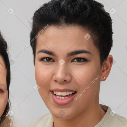 Joyful asian young-adult female with short  brown hair and brown eyes