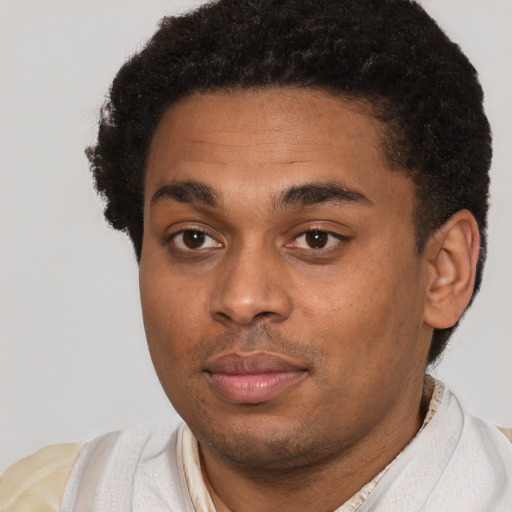 Neutral black young-adult male with short  black hair and brown eyes