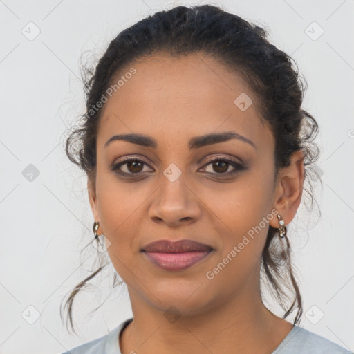 Joyful latino young-adult female with medium  brown hair and brown eyes