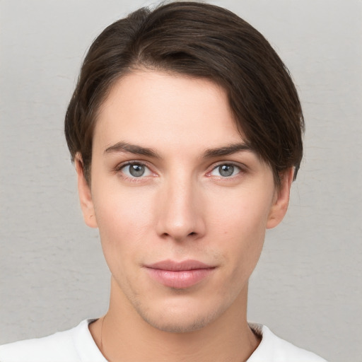 Neutral white young-adult female with short  brown hair and brown eyes