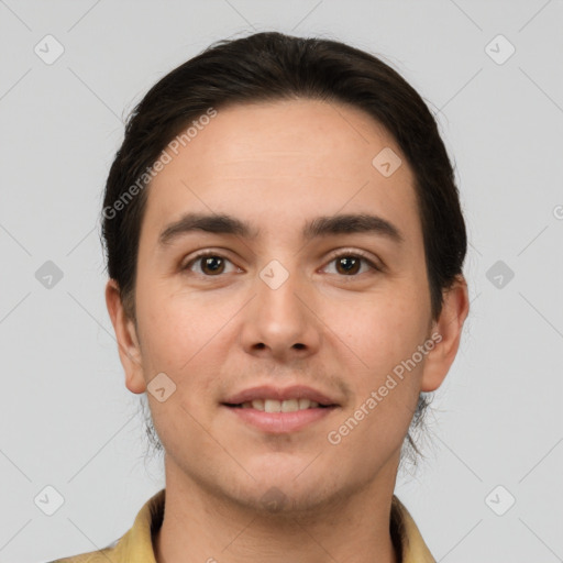 Joyful white young-adult male with short  brown hair and brown eyes