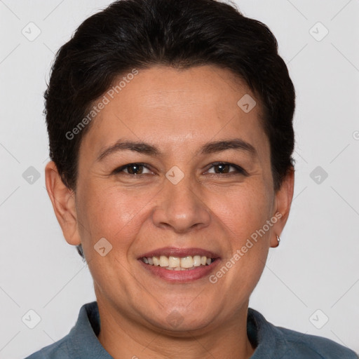 Joyful white adult female with short  brown hair and brown eyes