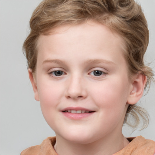 Joyful white child female with medium  brown hair and blue eyes