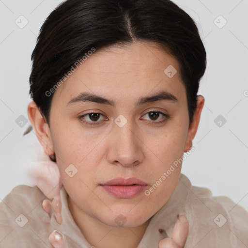 Joyful white young-adult female with short  brown hair and brown eyes