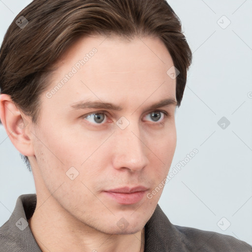 Neutral white young-adult male with short  brown hair and grey eyes