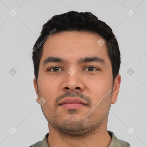 Neutral latino young-adult male with short  black hair and brown eyes