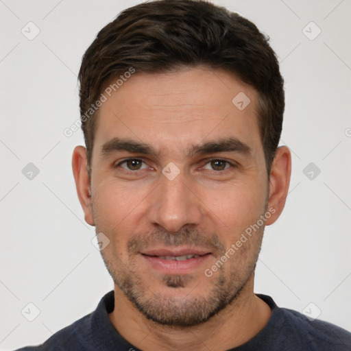 Joyful white young-adult male with short  brown hair and brown eyes