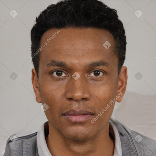 Neutral black young-adult male with short  black hair and brown eyes