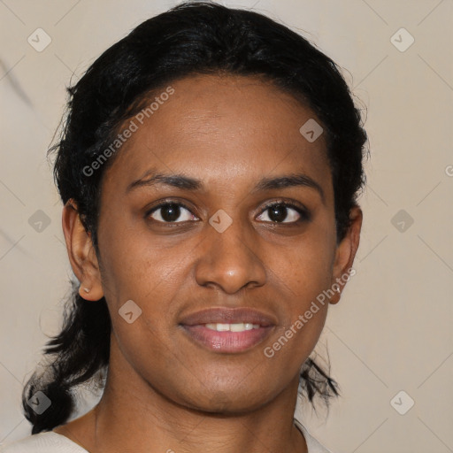 Joyful black young-adult female with medium  black hair and brown eyes