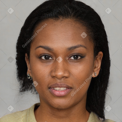 Joyful black young-adult female with short  brown hair and brown eyes