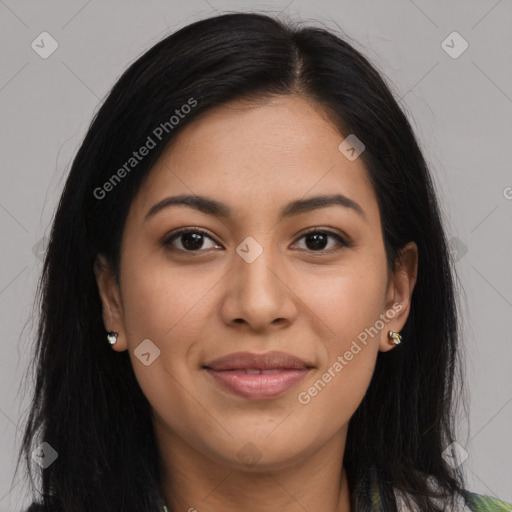 Joyful latino young-adult female with long  brown hair and brown eyes