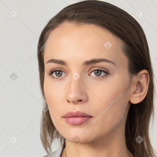 Neutral white young-adult female with long  brown hair and brown eyes