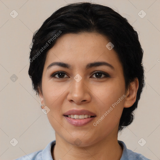 Joyful latino young-adult female with medium  black hair and brown eyes