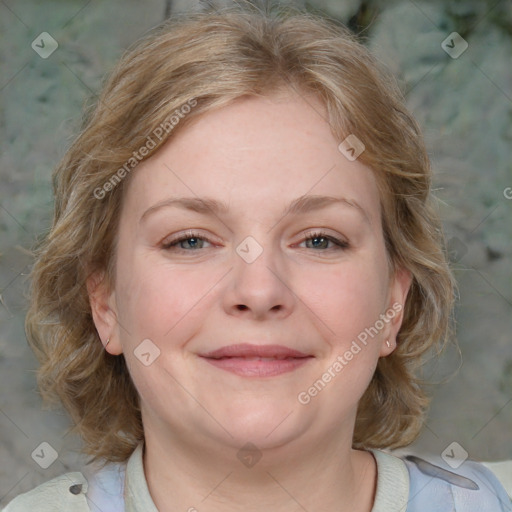 Joyful white young-adult female with medium  brown hair and blue eyes