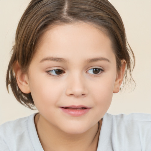 Joyful white child female with medium  brown hair and brown eyes