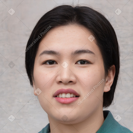 Joyful asian young-adult female with medium  black hair and brown eyes