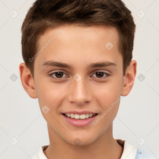 Joyful white child male with short  brown hair and brown eyes