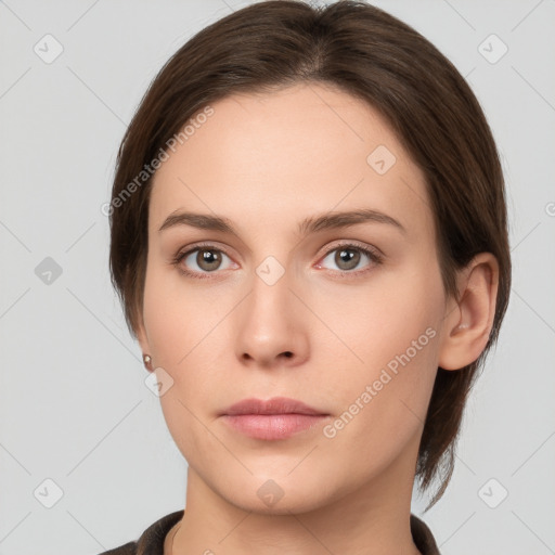 Neutral white young-adult female with medium  brown hair and grey eyes