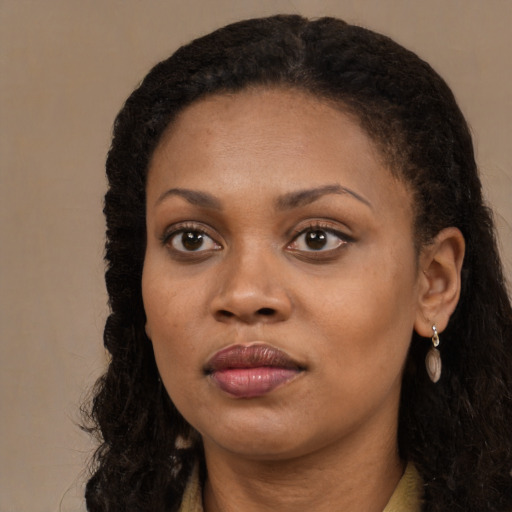 Neutral black young-adult female with long  black hair and brown eyes