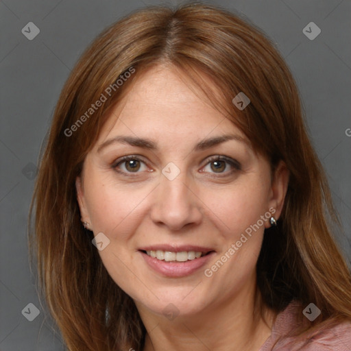 Joyful white adult female with medium  brown hair and brown eyes