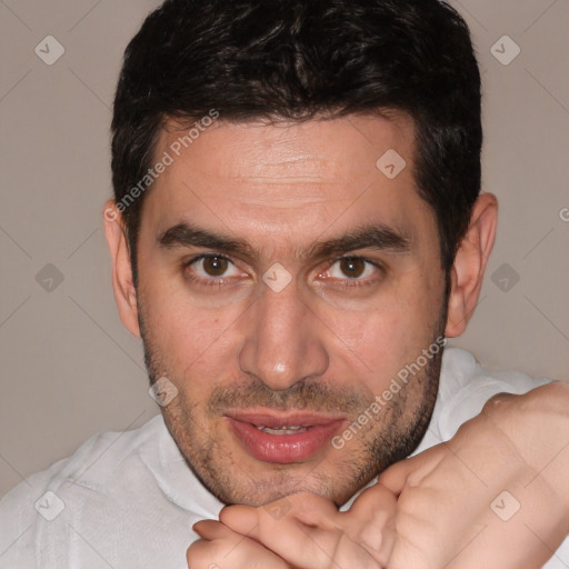 Joyful white adult male with short  brown hair and brown eyes