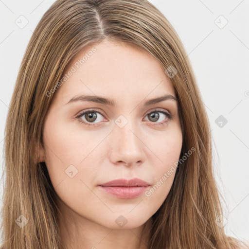 Neutral white young-adult female with long  brown hair and brown eyes