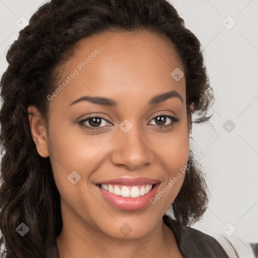 Joyful latino young-adult female with long  brown hair and brown eyes