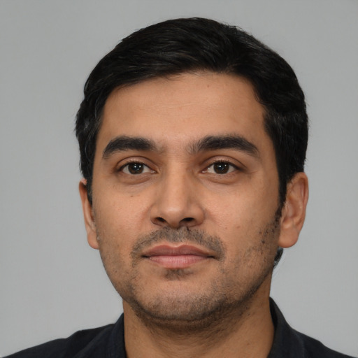 Neutral latino young-adult male with short  black hair and brown eyes