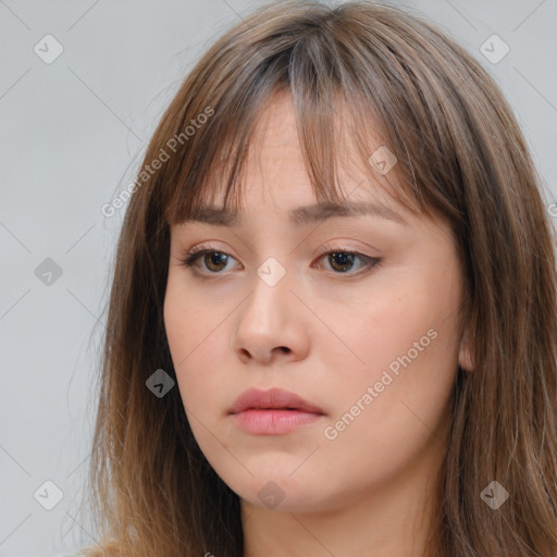 Neutral white young-adult female with long  brown hair and brown eyes