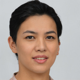 Joyful asian young-adult female with short  black hair and brown eyes