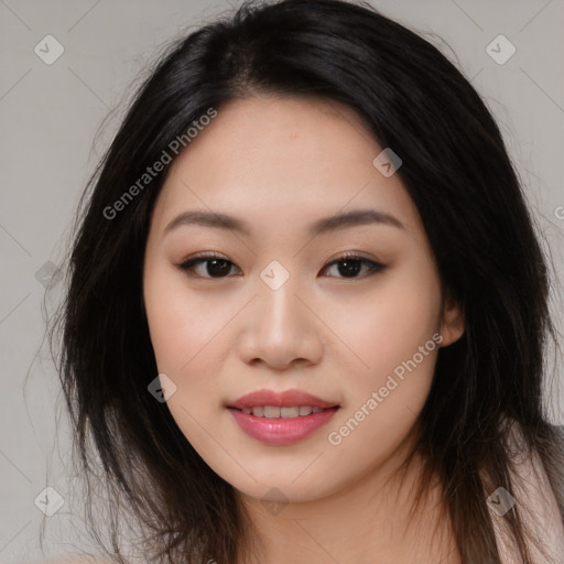 Joyful asian young-adult female with long  brown hair and brown eyes