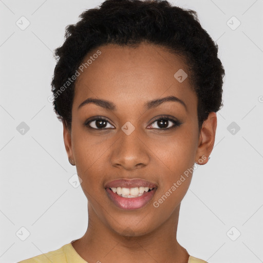 Joyful black young-adult female with short  black hair and brown eyes