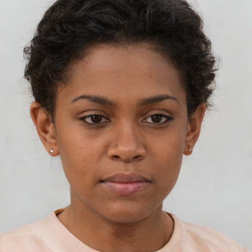 Neutral latino young-adult female with short  brown hair and brown eyes