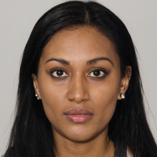 Neutral latino young-adult female with long  black hair and brown eyes