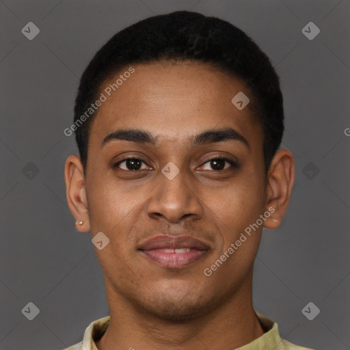 Joyful black young-adult male with short  brown hair and brown eyes