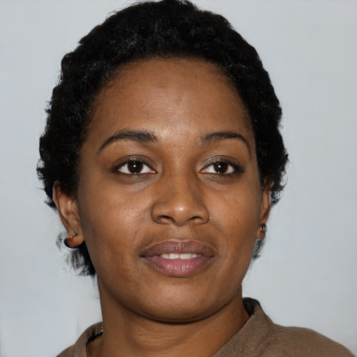 Neutral black young-adult female with short  black hair and brown eyes