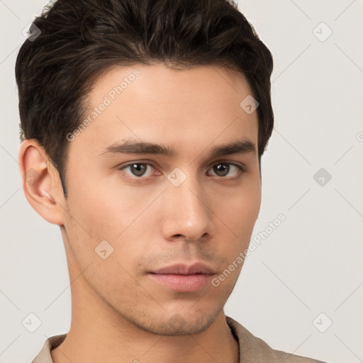 Neutral white young-adult male with short  brown hair and brown eyes