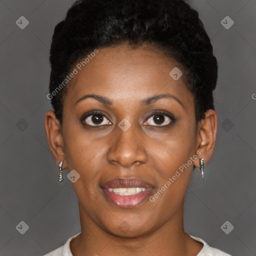 Joyful black young-adult female with short  brown hair and brown eyes