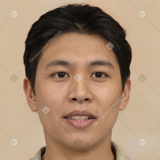 Joyful asian young-adult male with short  brown hair and brown eyes