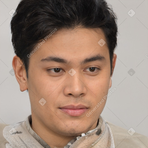 Joyful latino young-adult male with short  brown hair and brown eyes