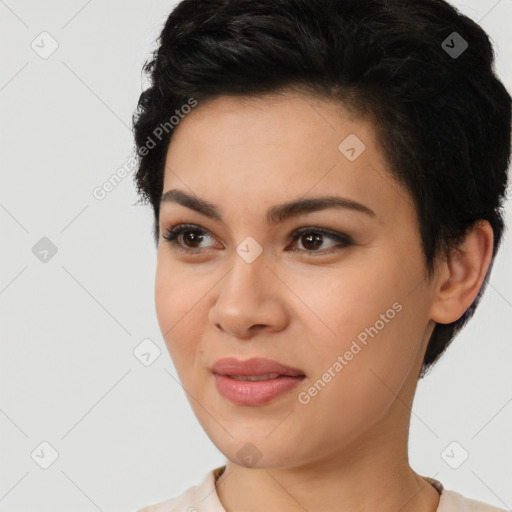 Joyful latino young-adult female with short  brown hair and brown eyes