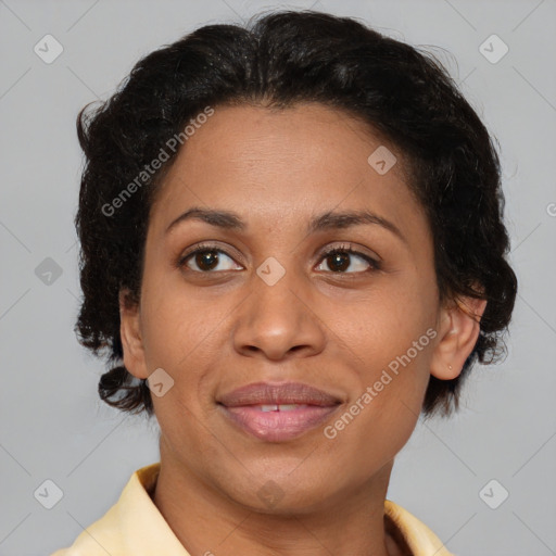 Joyful black adult female with short  brown hair and brown eyes