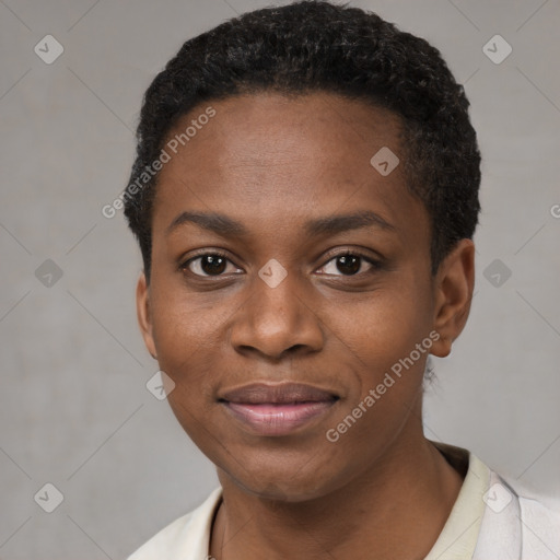 Joyful black young-adult female with short  black hair and brown eyes