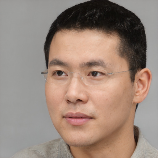 Neutral asian young-adult male with short  black hair and brown eyes