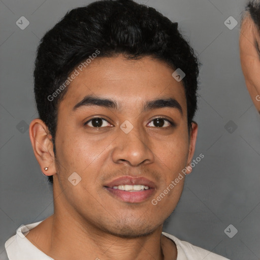 Joyful latino young-adult male with short  brown hair and brown eyes