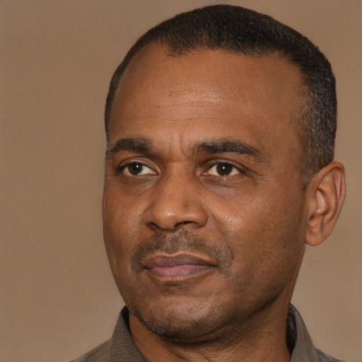 Neutral black adult male with short  brown hair and brown eyes