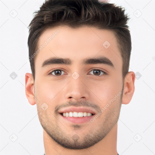 Joyful white young-adult male with short  brown hair and brown eyes